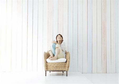 Young woman relaxing Stock Photo - Premium Royalty-Free, Code: 670-03710132