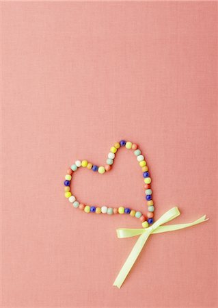 simsearch:670-03734345,k - Coeur et ruban Photographie de stock - Premium Libres de Droits, Code: 670-03734351