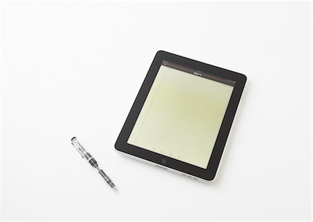 Tablet PC and pen Foto de stock - Sin royalties Premium, Código: 670-03886456