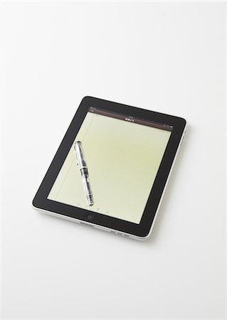 Tablet PC and pen Foto de stock - Sin royalties Premium, Código: 670-03886457