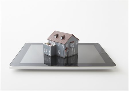 prêt - Tablet PC et maison modèle miniature Photographie de stock - Premium Libres de Droits, Code: 670-03886465