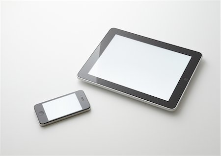 Tablet PC and smartphone Stock Photo - Premium Royalty-Free, Code: 670-03886498