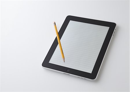 Tablet PC and pencil Foto de stock - Sin royalties Premium, Código: 670-03886492