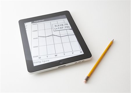 stock exchange - Tablet PC and pencil Stock Photo - Premium Royalty-Free, Code: 670-03886577