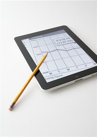 Tablet PC and pencil Stock Photo - Premium Royalty-Free, Code: 670-03886578