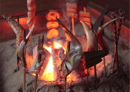 Robatayaki(Barbecue grilled in sunken hearth) Stock Photo - Premium Royalty-Free, Code: 670-03886624
