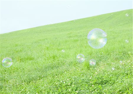 deriva - Grass field and bubbles Foto de stock - Sin royalties Premium, Código: 670-03887050