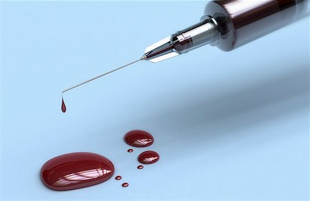 A syringe filled with blood Stock Photo - Premium Royalty-Free, Code: 671-02101681