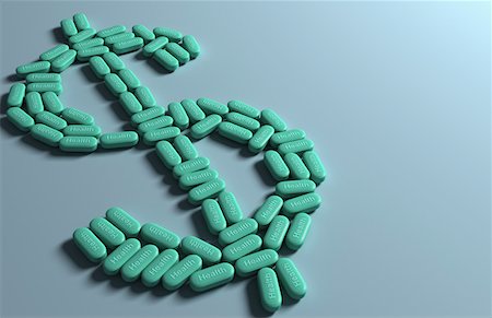 Multiple green pills forming the shape of a dollar Stock Photo - Premium Royalty-Free, Code: 671-02101925