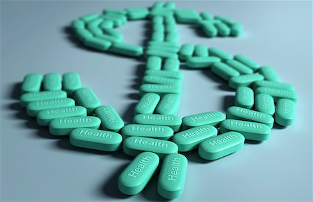 Multiple green pills forming the shape of a dollar Stock Photo - Premium Royalty-Free, Code: 671-02101963