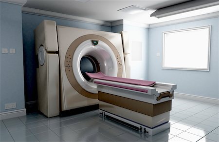 escáner - A CT scanner Foto de stock - Sin royalties Premium, Código: 671-02102389