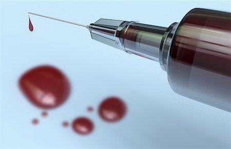 A syringe filled with blood Stock Photo - Premium Royalty-Free, Code: 671-02102513