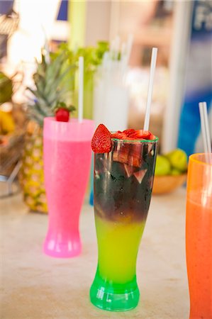 simsearch:700-05854903,k - Row of colorful drinks on counter Stock Photo - Premium Royalty-Free, Code: 673-06964609