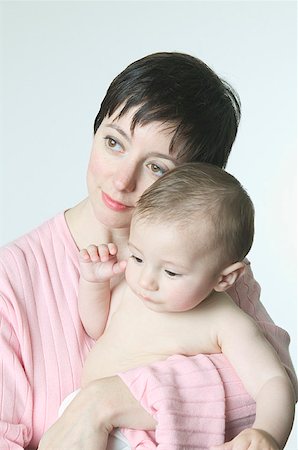 simsearch:673-02138552,k - Studio portrait of a mother and baby. Stock Photo - Premium Royalty-Free, Code: 673-02137591