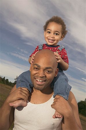 simsearch:673-02138552,k - A toddler riding on his father's shoulders. Stock Photo - Premium Royalty-Free, Code: 673-02137621