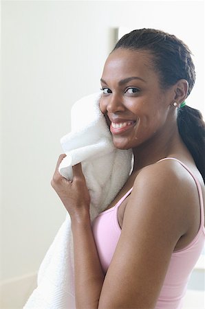 pretty woman skin smile - Woman drying her face with a towel. Stock Photo - Premium Royalty-Free, Code: 673-02137674