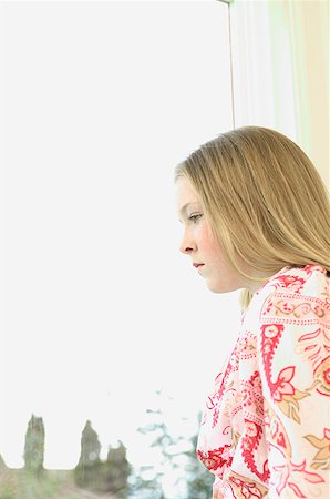 passoire - Profile of a teenage girl looking out a window. Stock Photo - Premium Royalty-Free, Code: 673-02137759
