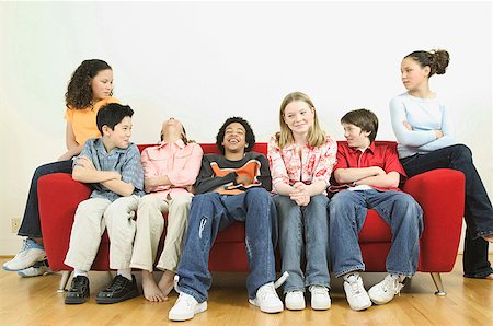 Seven teenage kids hanging out together. Stock Photo - Premium Royalty-Free, Code: 673-02137773