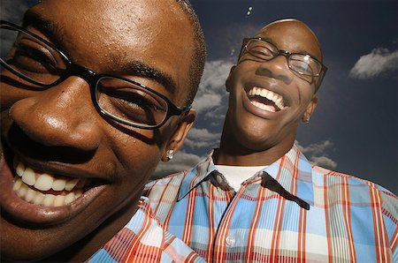 Portrait of twin teenage boys wearing glasses. Foto de stock - Sin royalties Premium, Código: 673-02137889