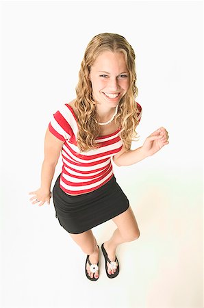 fashion women flip flops - Blonde teenage girl dancing. Stock Photo - Premium Royalty-Free, Code: 673-02137982