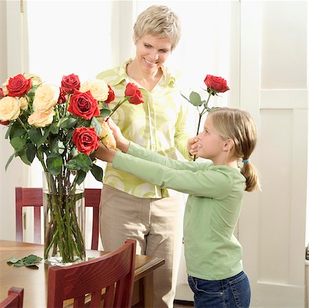 simsearch:673-02138552,k - Mother arranging roses with her daughter. Stock Photo - Premium Royalty-Free, Code: 673-02138060