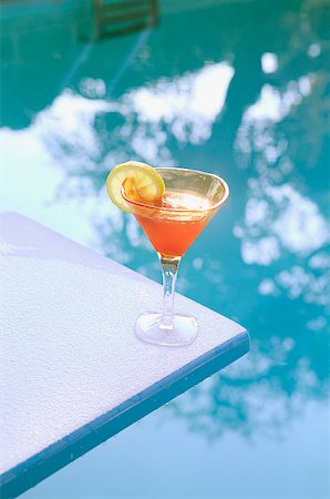 A cocktail on a diving board. Stock Photo - Premium Royalty-Free, Code: 673-02138236