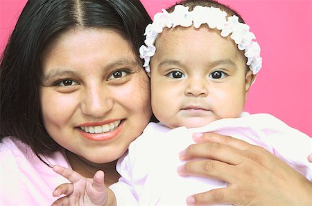 A young mother and her baby daughter. Stock Photo - Premium Royalty-Free, Code: 673-02138347