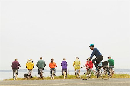 fit elderly - Nine people on exercycles and one on a bike Stock Photo - Premium Royalty-Free, Code: 673-02138864