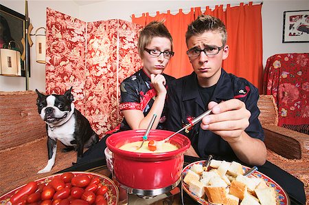 simsearch:673-02139064,k - Couple at home having fondue Stock Photo - Premium Royalty-Free, Code: 673-02139022