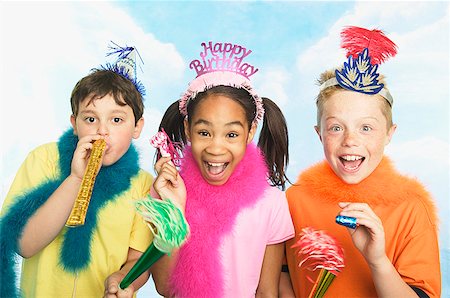 funny birthday - Boys and girl in party hats Stock Photo - Premium Royalty-Free, Code: 673-02139062