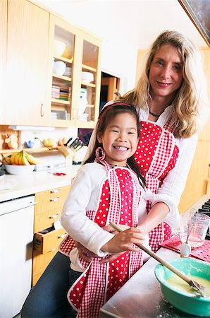 sweet lady cooking - Portrait of mother and child cooking together Stock Photo - Premium Royalty-Free, Code: 673-02139081