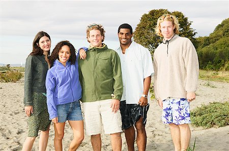 Portrait of friends at the beach Stock Photo - Premium Royalty-Free, Code: 673-02139144