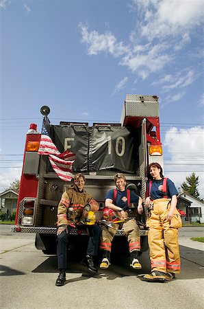 female asian firefighters - Portrait of three firefighters Stock Photo - Premium Royalty-Free, Code: 673-02139231