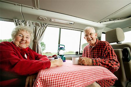 person fun inside car - Senior couple sitting together in their van Stock Photo - Premium Royalty-Free, Code: 673-02139429