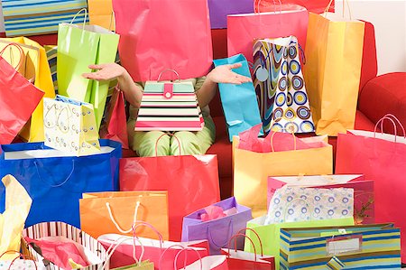 Woman surrounded by shopping bags Foto de stock - Sin royalties Premium, Código: 673-02139447