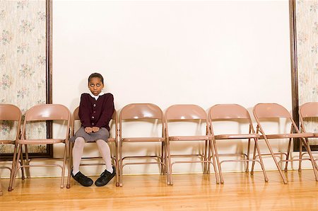 embarrassed kid - Girl sitting alone Stock Photo - Premium Royalty-Free, Code: 673-02139511