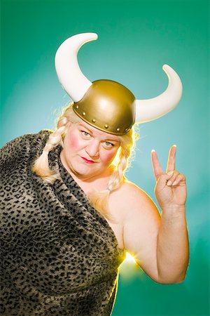 ridiculous fat person - Large woman flashing the peace sign Stock Photo - Premium Royalty-Free, Code: 673-02139835