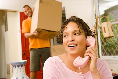 simsearch:673-02140216,k - Woman talking on phone while moving Stock Photo - Premium Royalty-Free, Code: 673-02139889