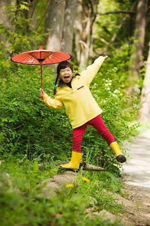 rain little girl - Happy little girl posing with parasol Foto de stock - Sin royalties Premium, Código: 673-02140008