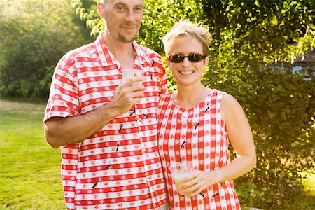 Couple with matching picnic clothing Stock Photo - Premium Royalty-Free, Code: 673-02140065