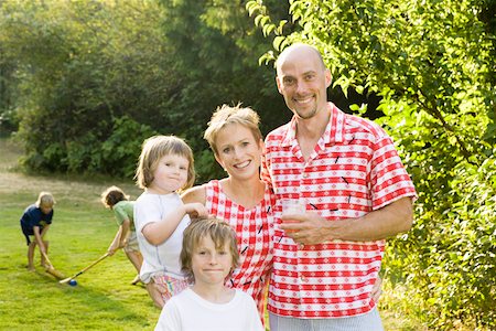 Portrait of family in picnic clothing Stock Photo - Premium Royalty-Free, Code: 673-02140069
