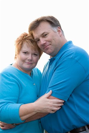 simsearch:673-02140177,k - Portrait of middle aged couple hugging Fotografie stock - Premium Royalty-Free, Codice: 673-02140426