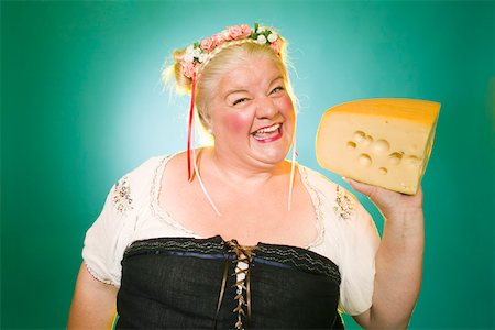 simsearch:673-02139828,k - Woman in Germanic costume with cheese wedge Foto de stock - Sin royalties Premium, Código: 673-02140477