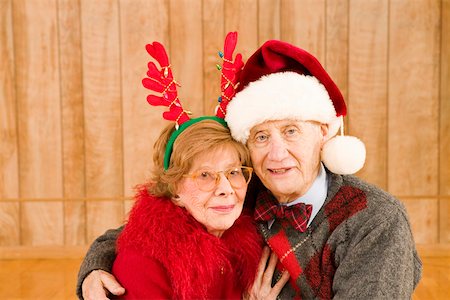 simsearch:673-02140177,k - Portrait of elderly couple at Christmastime Fotografie stock - Premium Royalty-Free, Codice: 673-02140608