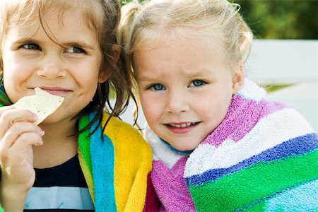Closeup of two little girls in towels Stock Photo - Premium Royalty-Free, Code: 673-02140630
