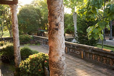 simsearch:673-02140712,k - Carved pillars and gardens in Vietnamese Imperial City Stock Photo - Premium Royalty-Free, Code: 673-02140689