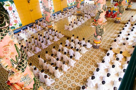 Rows of nuns and monks in Vietnamese temple Stock Photo - Premium Royalty-Free, Code: 673-02140718