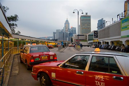 Taxis outside terminal near downtown Hong Kong Stock Photo - Premium Royalty-Free, Code: 673-02140724