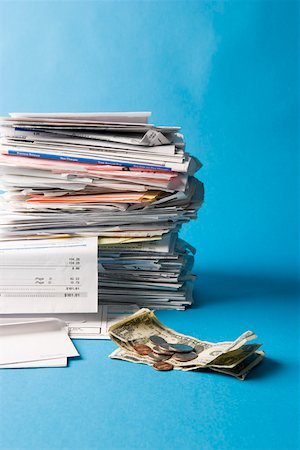 Closeup of stack of bills with money Stock Photo - Premium Royalty-Free, Code: 673-02140867