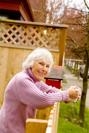 Portrait of senior woman holding mug Stock Photo - Premium Royalty-Free, Code: 673-02141067